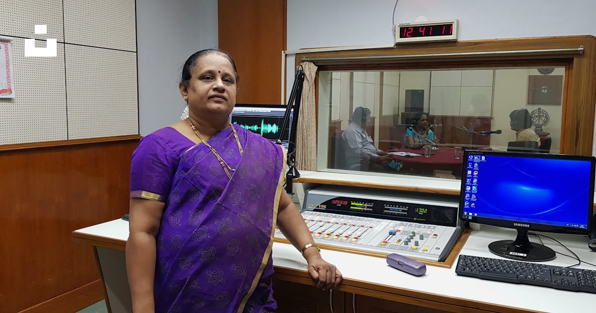 Woman standing near flat screen monitor inside room photo – Free India ...