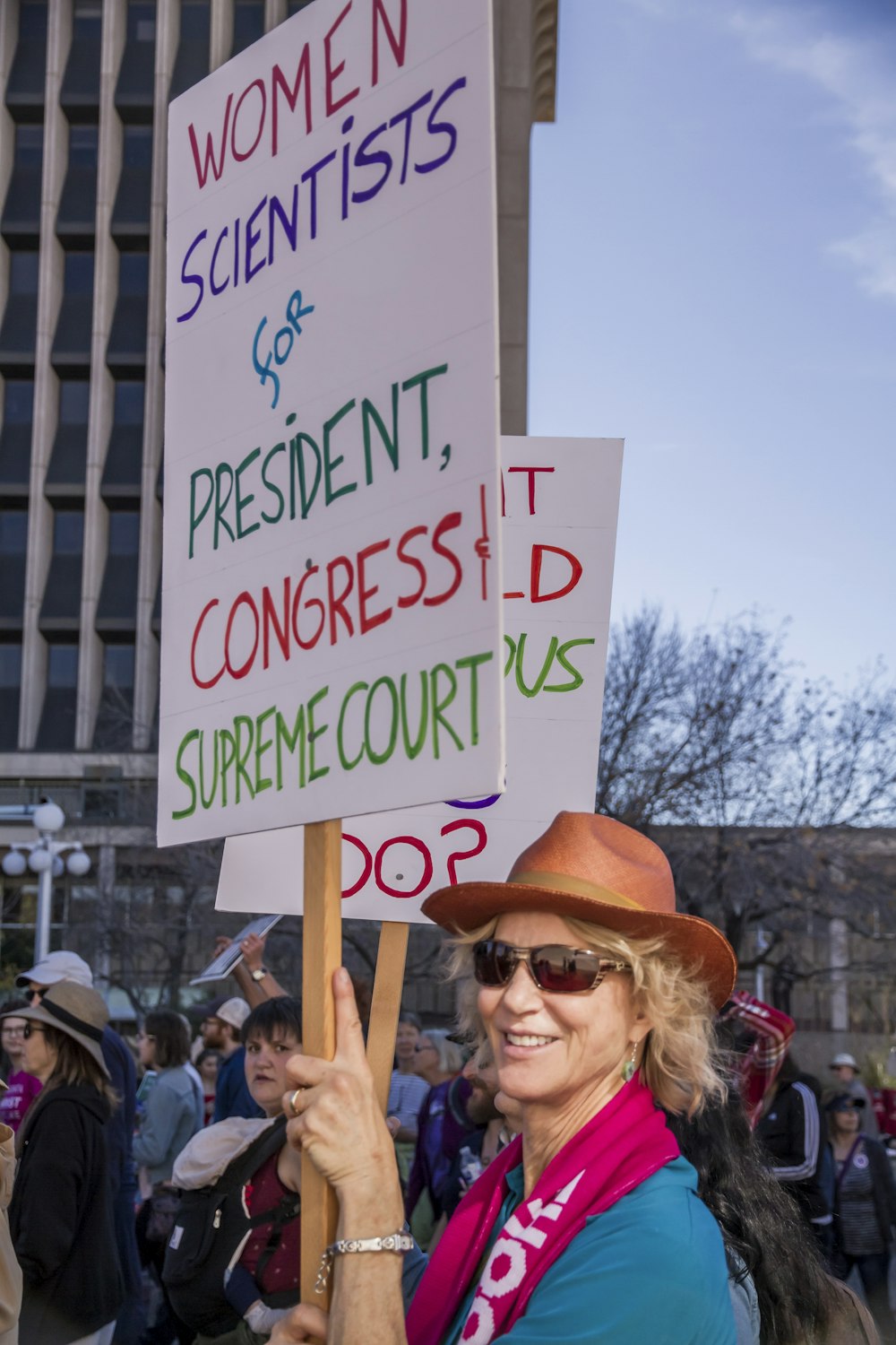 person holding poster