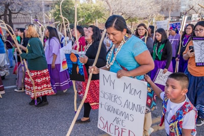 group of women walking at the street protesting about woman's right native american zoom background