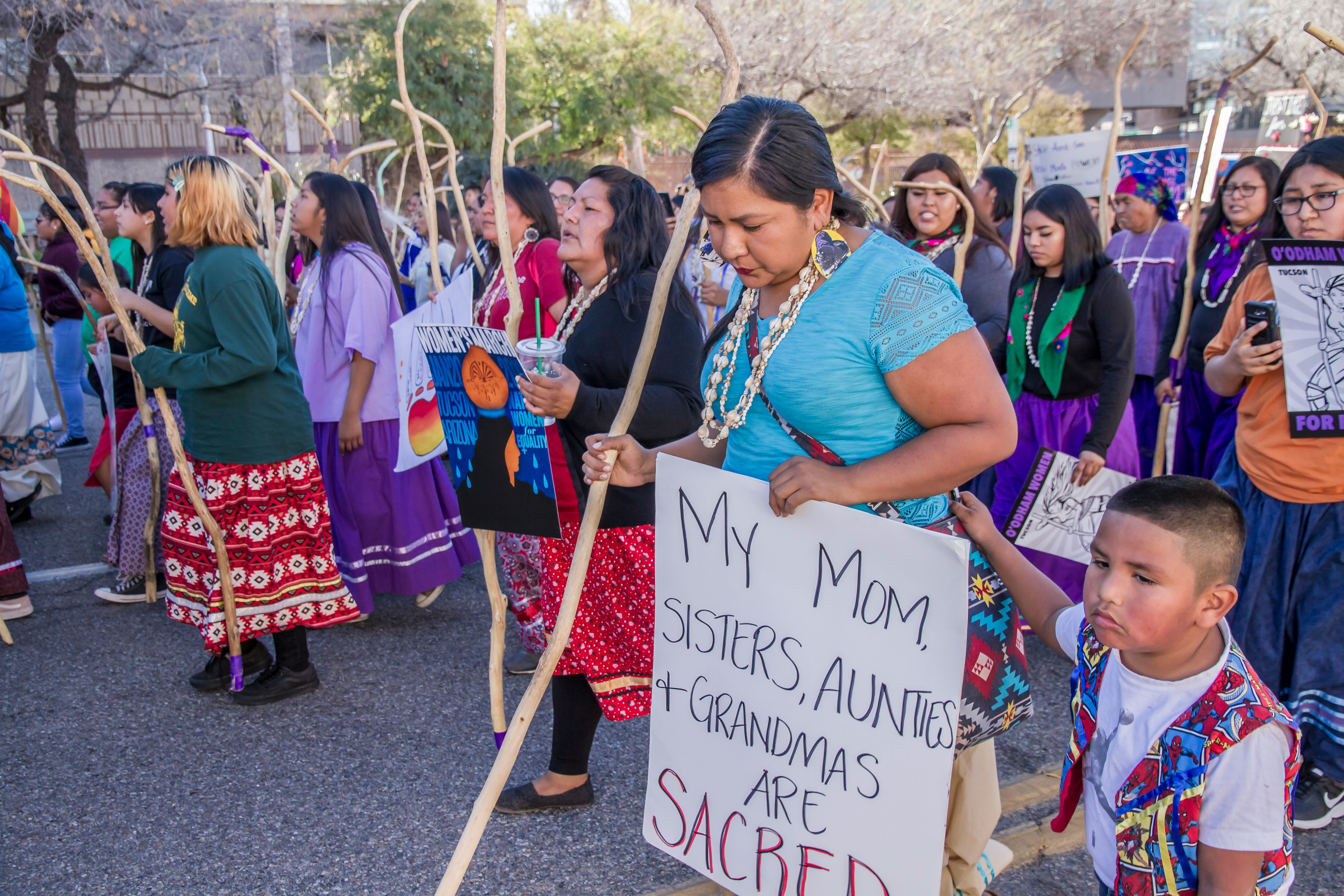 group of women walking at the street protesting about woman's right