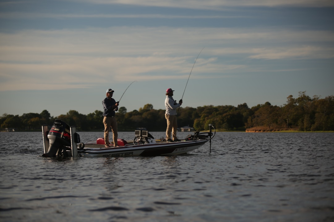 Men fishing peacefully on a lake