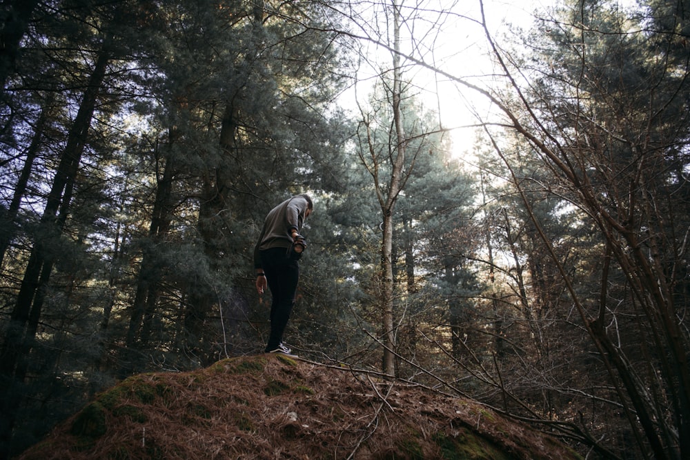 man standing on rock