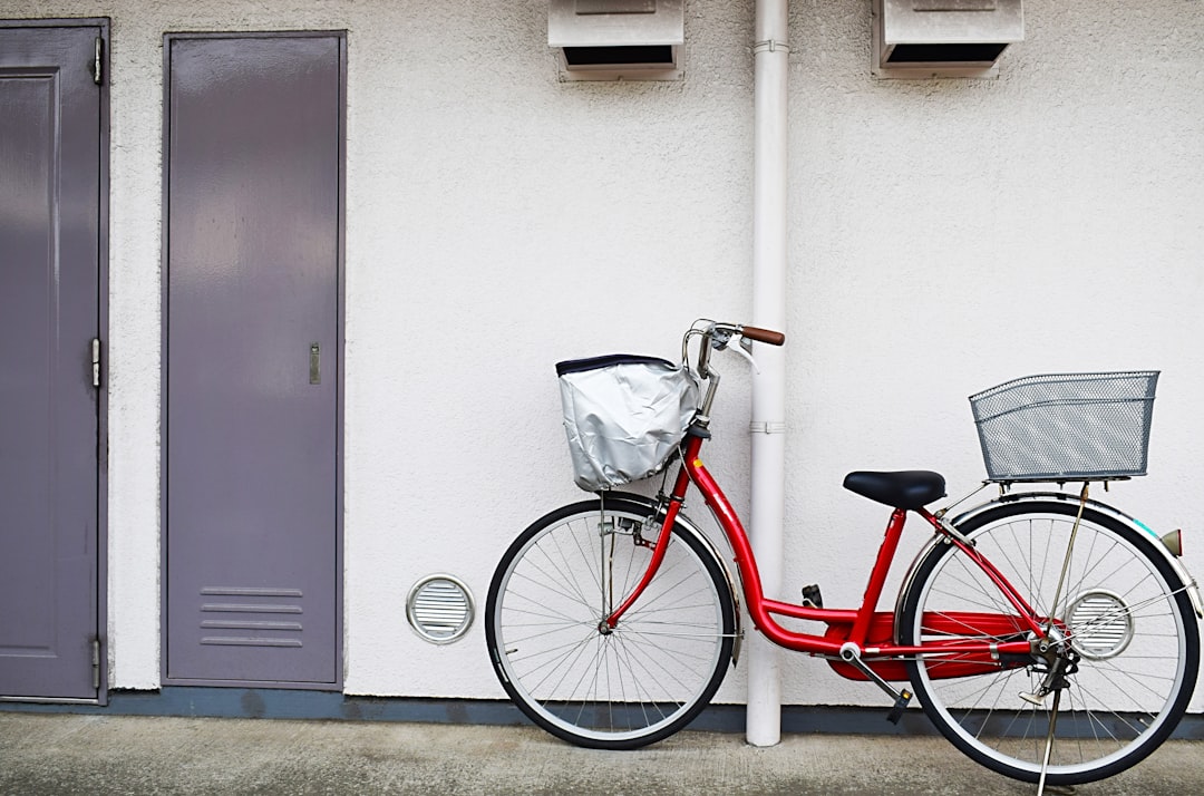 red and black step-through bike