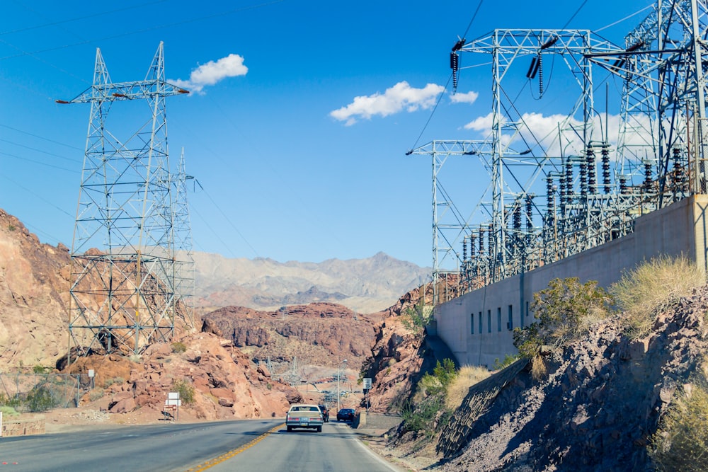 vehicle on roadway near mountains