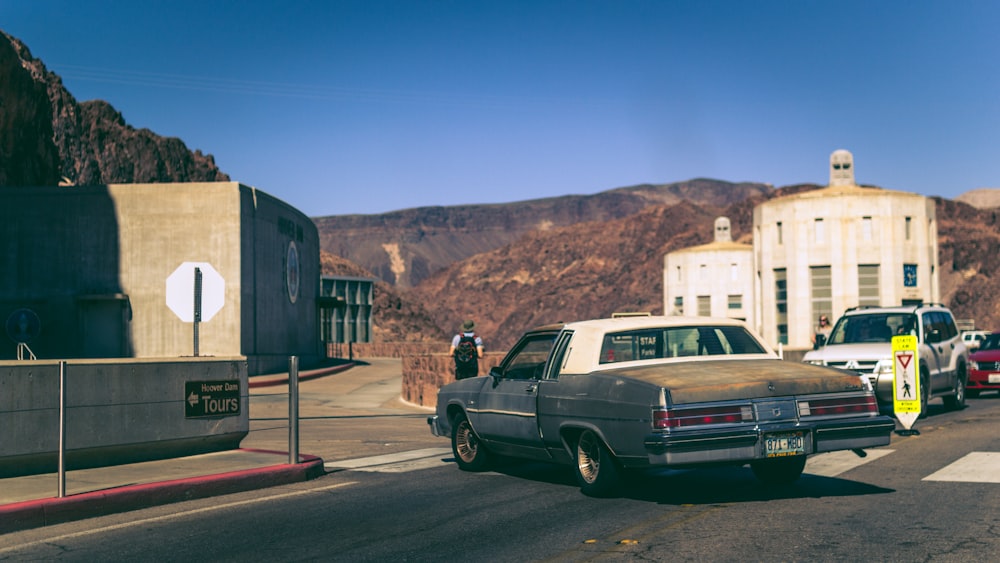 vehicles on roadway near building