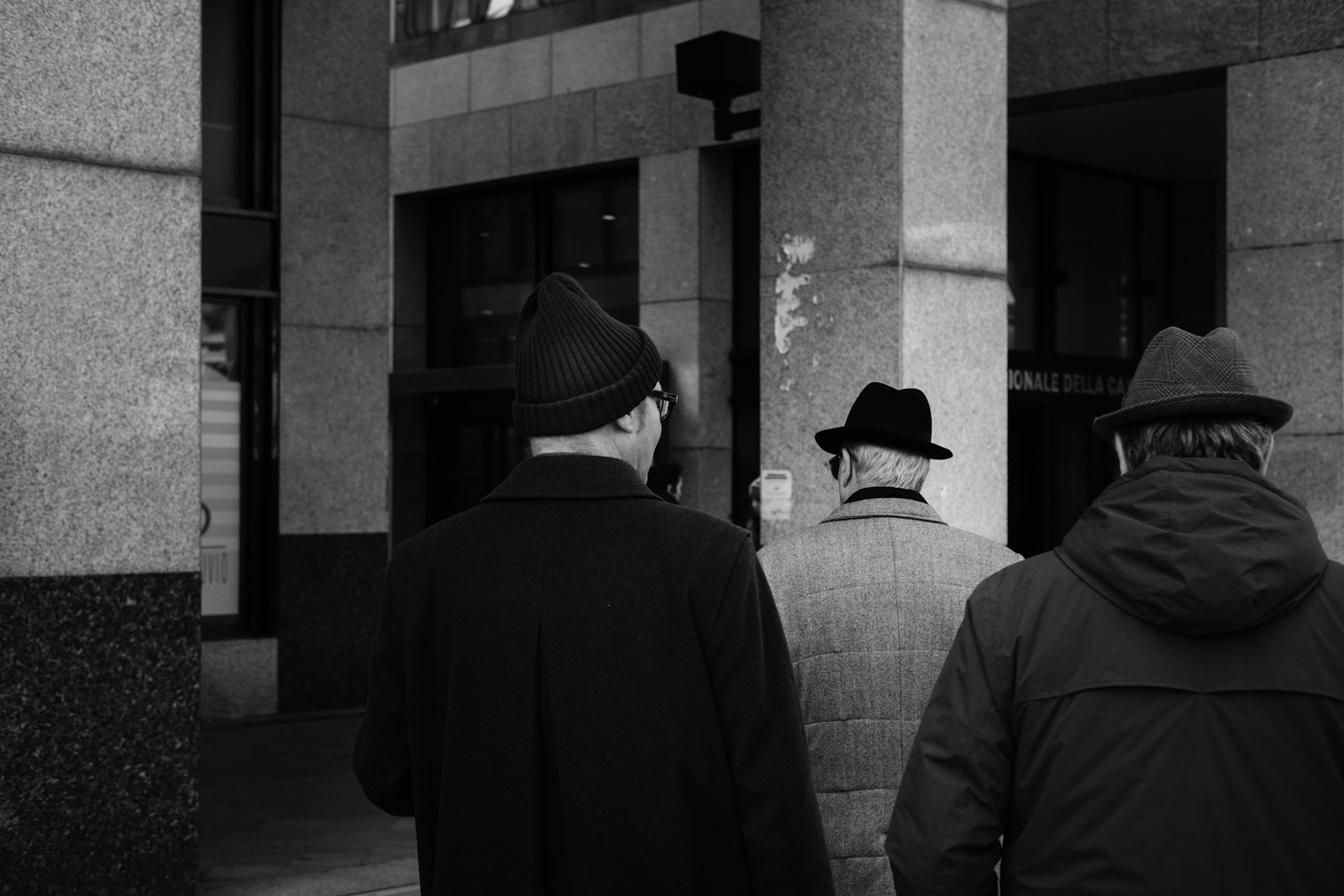 Fujifilm X-E3 + Fujifilm XF 35mm F2 R WR sample photo. Three men walking near photography