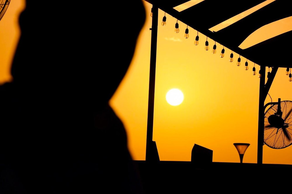 wall fan on post during golden hour