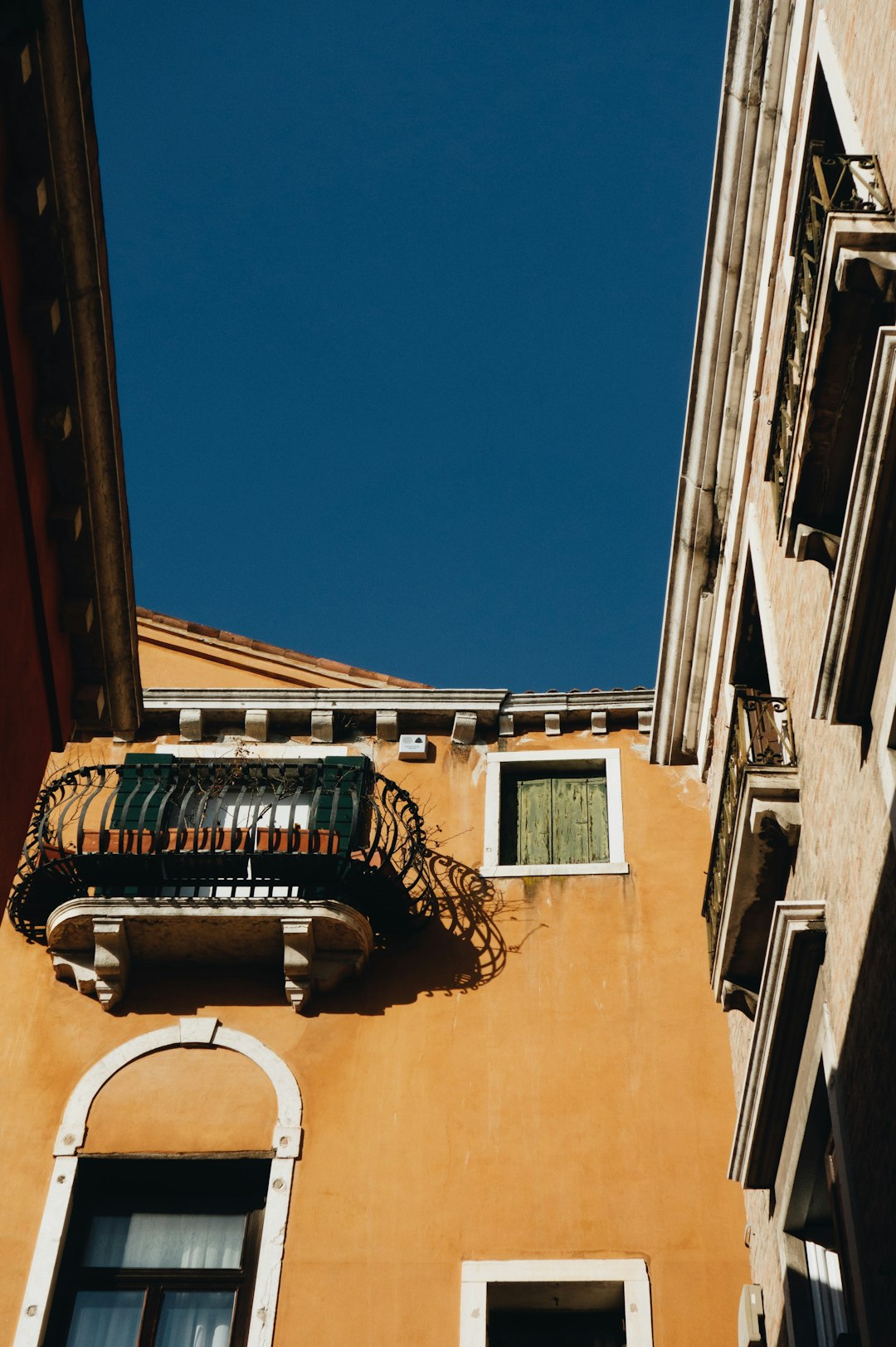 low-angle photography of brown building at daytime