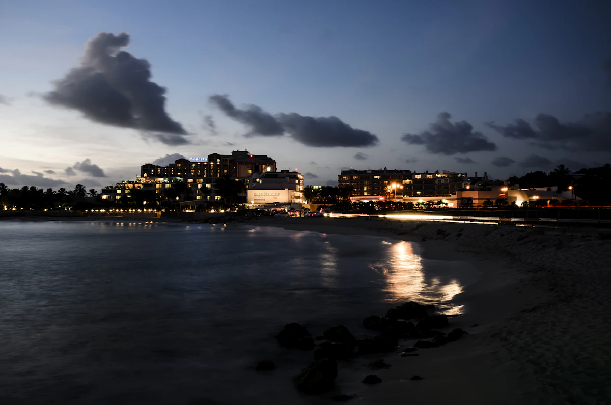 A St. Maarten beach and waterfront lit up at night