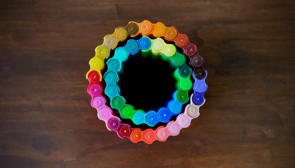 rainbow color chain on brown surface