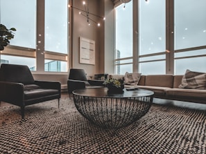 Modern living room with sleek furniture and natural lighting