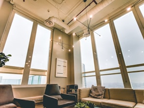 Open lounge space featuring casual chairs and natural light.