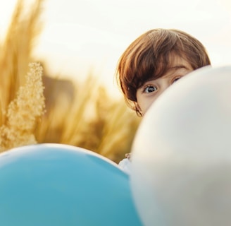 woman hiding on balloon