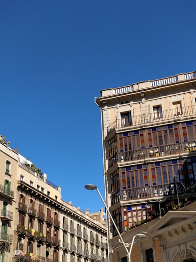 two high rise buildings under blue sky