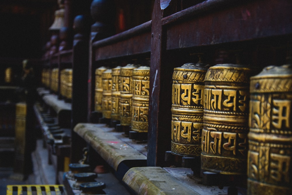 brass-colored urns