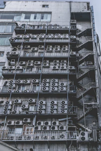 A stack of used air conditioners ready for pickup in Gurugram.