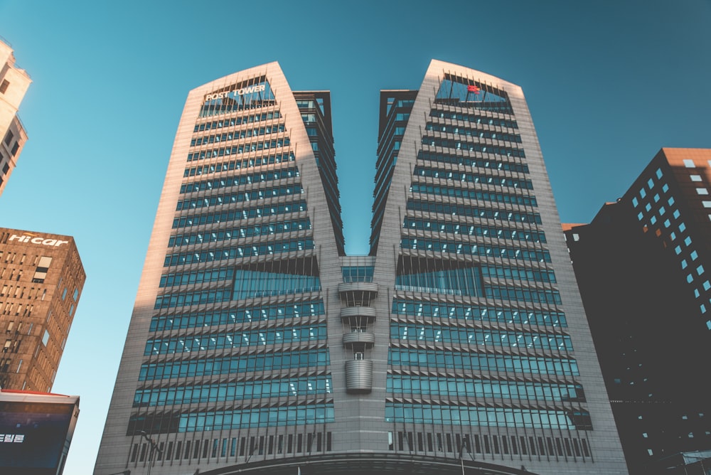 gray high rise buildings under blue sky
