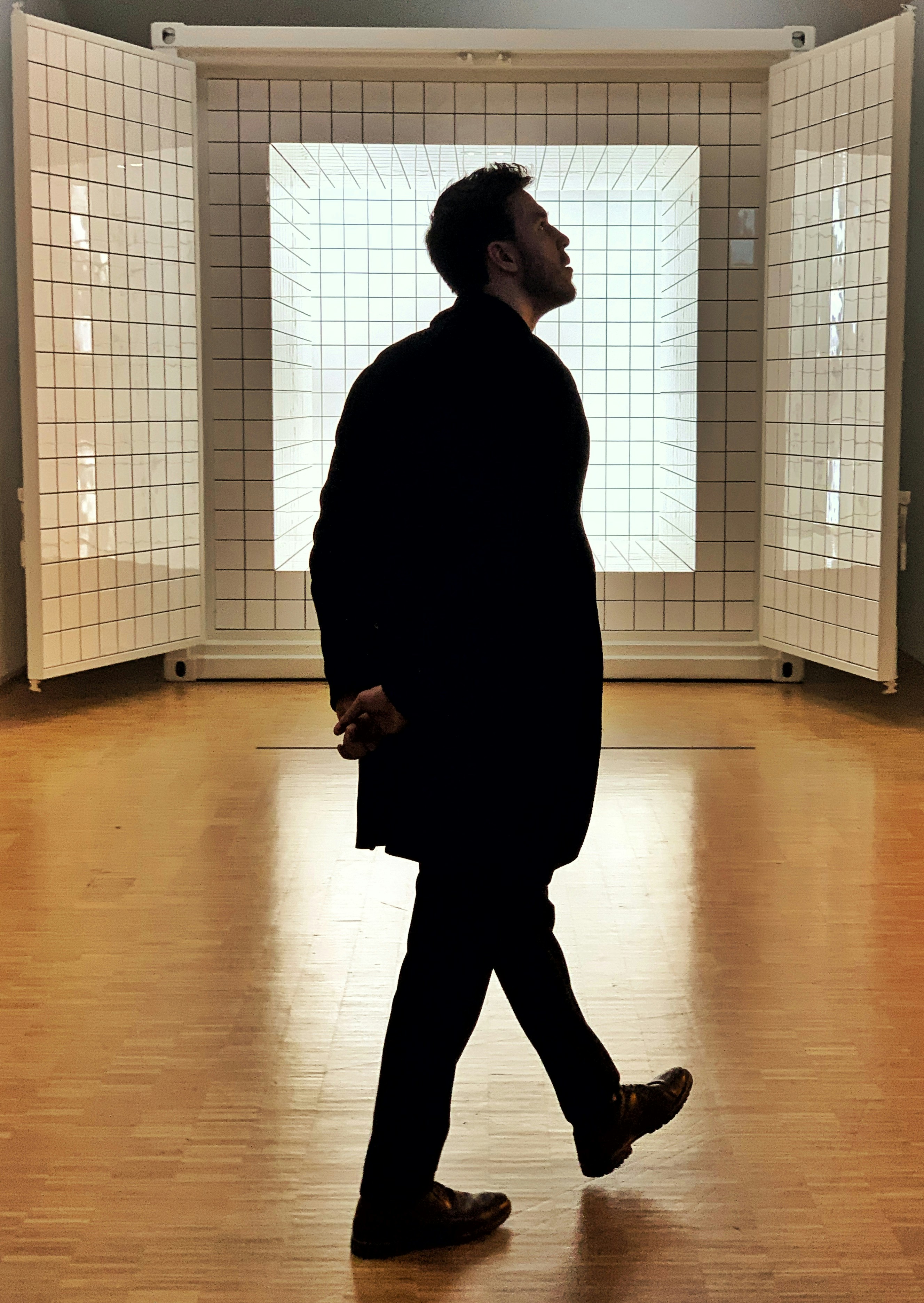 great photo recipe,how to photograph man in black coat standing inside room
