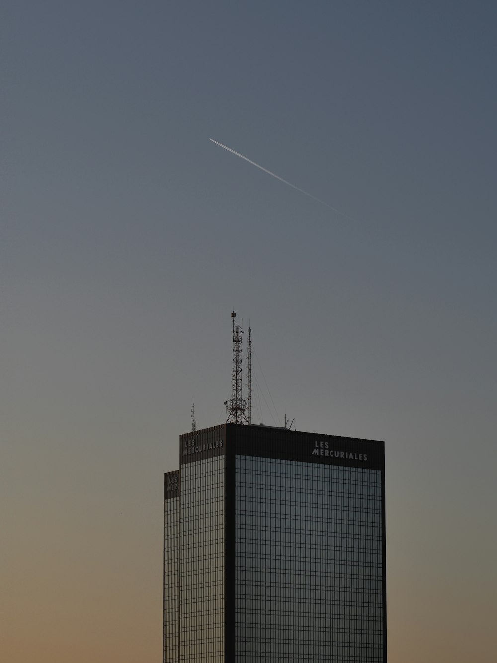 black and grey high-rise building