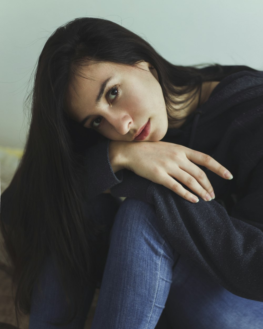 woman sitting on floor