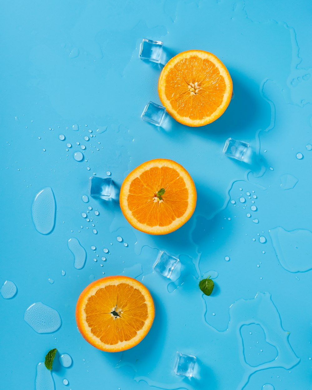 three sliced citrus oranges