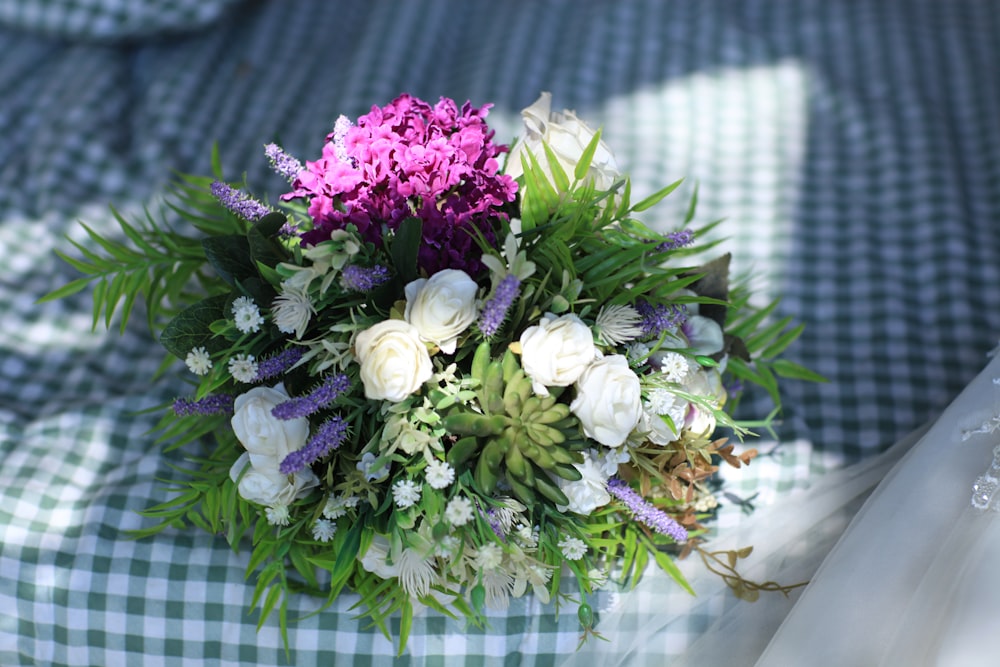 white and purple flower bouquet