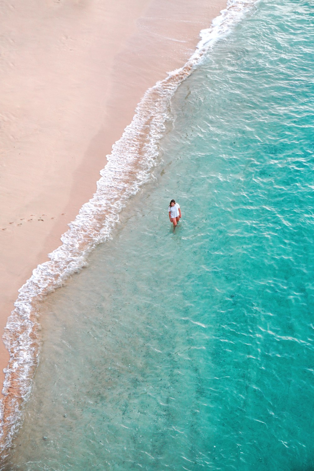 person standing by the sea