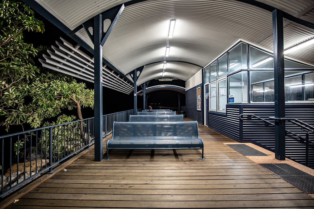 empty chairs under roof with lights on