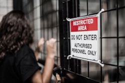 Restricted Area sign at the cyclone fence