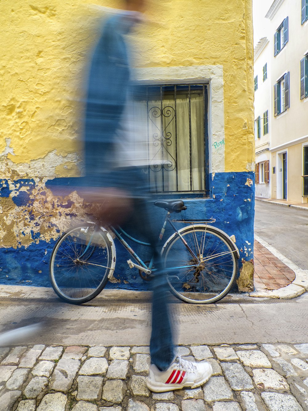 time lapse photo of person near bike