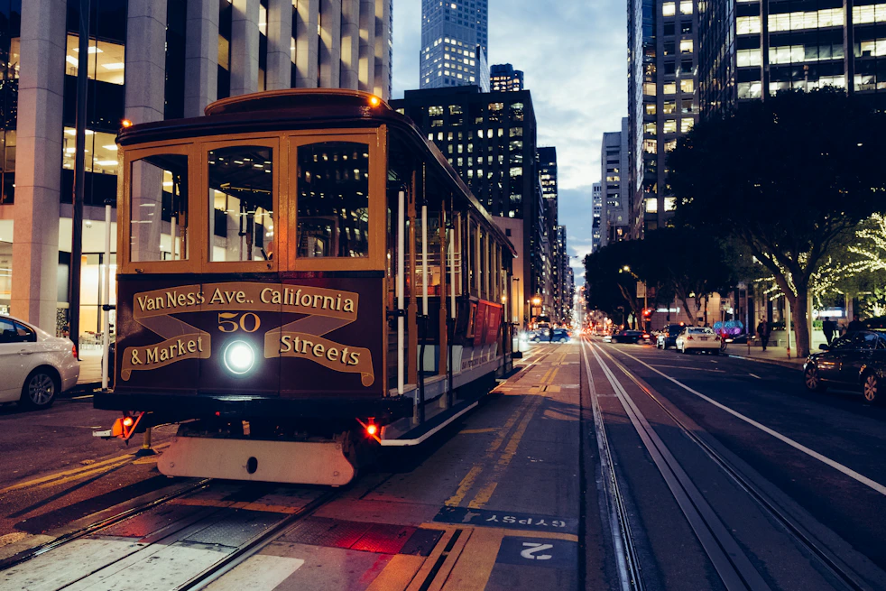 yellow and maroon city train