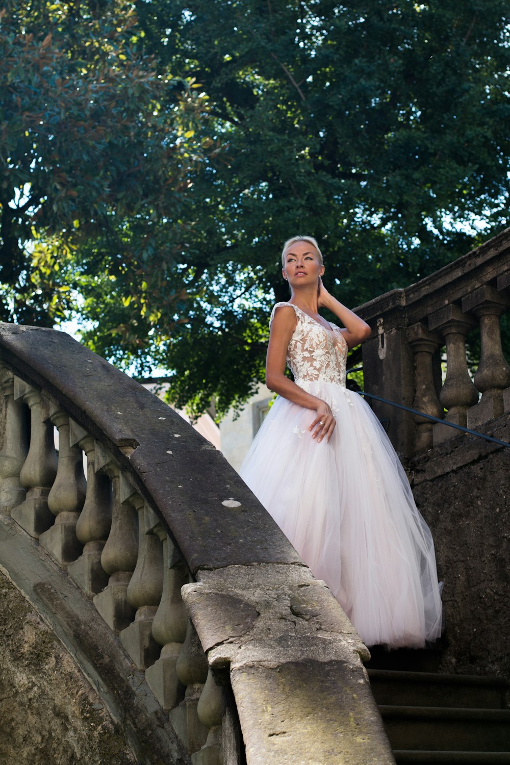 woman wearing white wedding gown