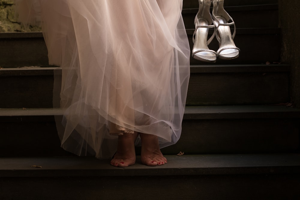 woman in barefoot on stairs