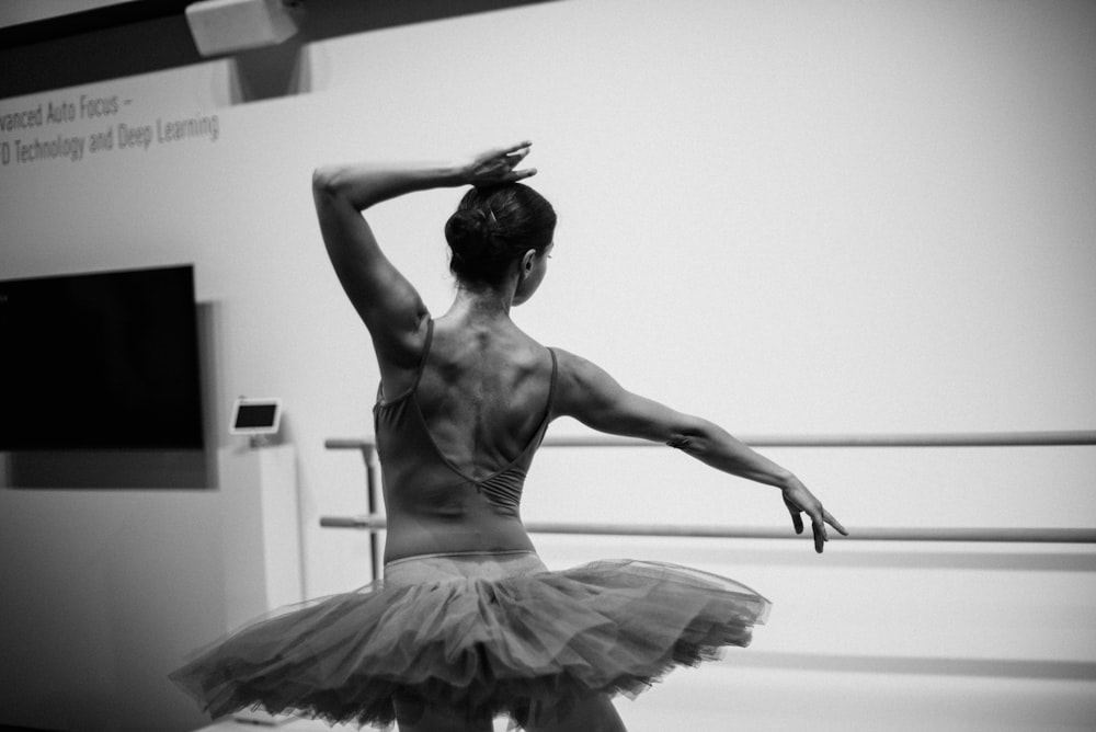 grayscale photo of ballerina