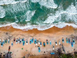 aerial photography of boats on shore during daytime