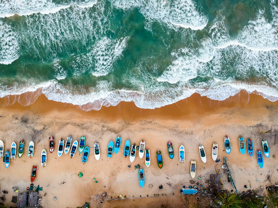 Boats drawn up on the shore before dawn