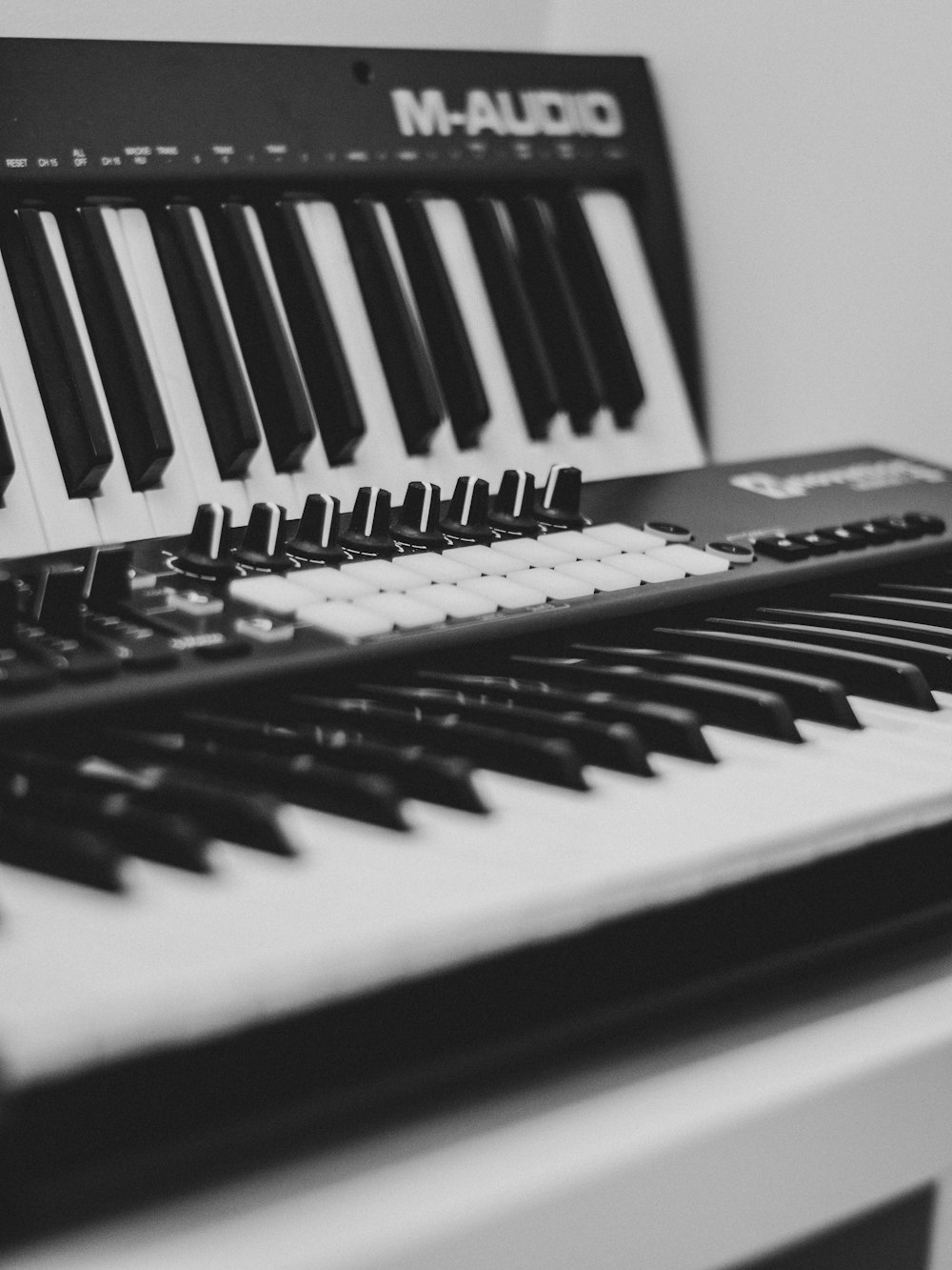 black and white M-Audio electronic keyboard
