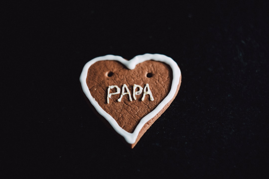 heart-shaped cookie with papa decoration