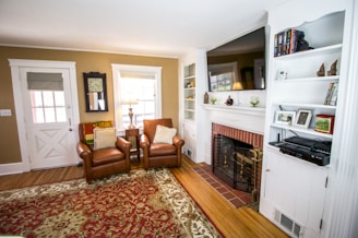 A family room with custom built-ins and fresh paint, creating a cozy atmosphere.