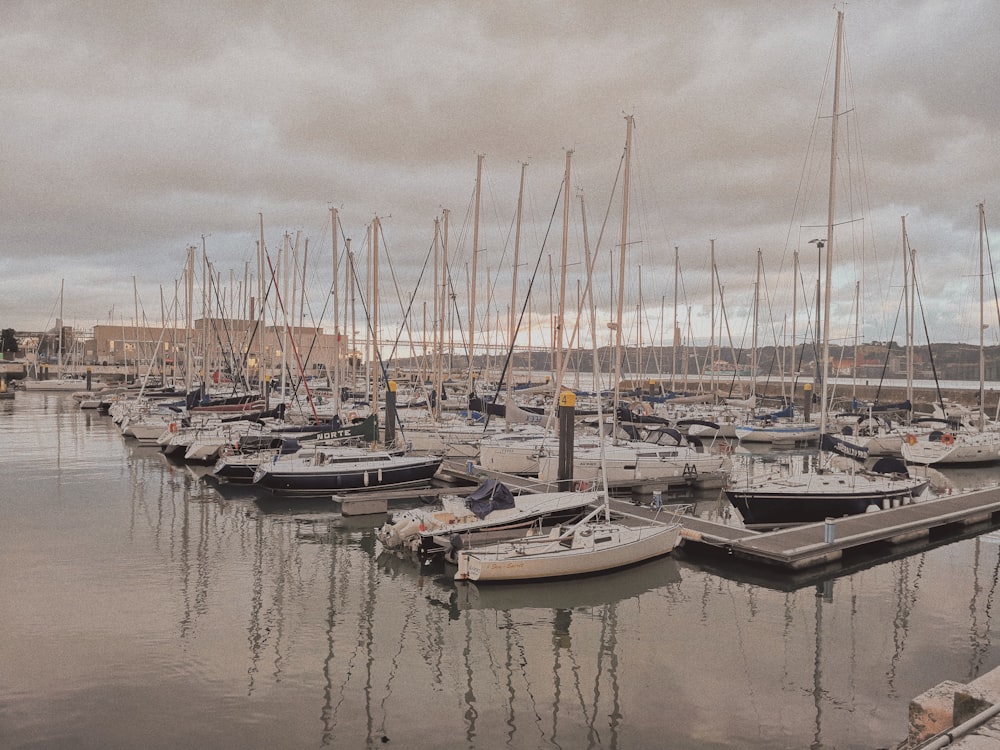 cuddy boat parked beside beach dock under nimbus clouds