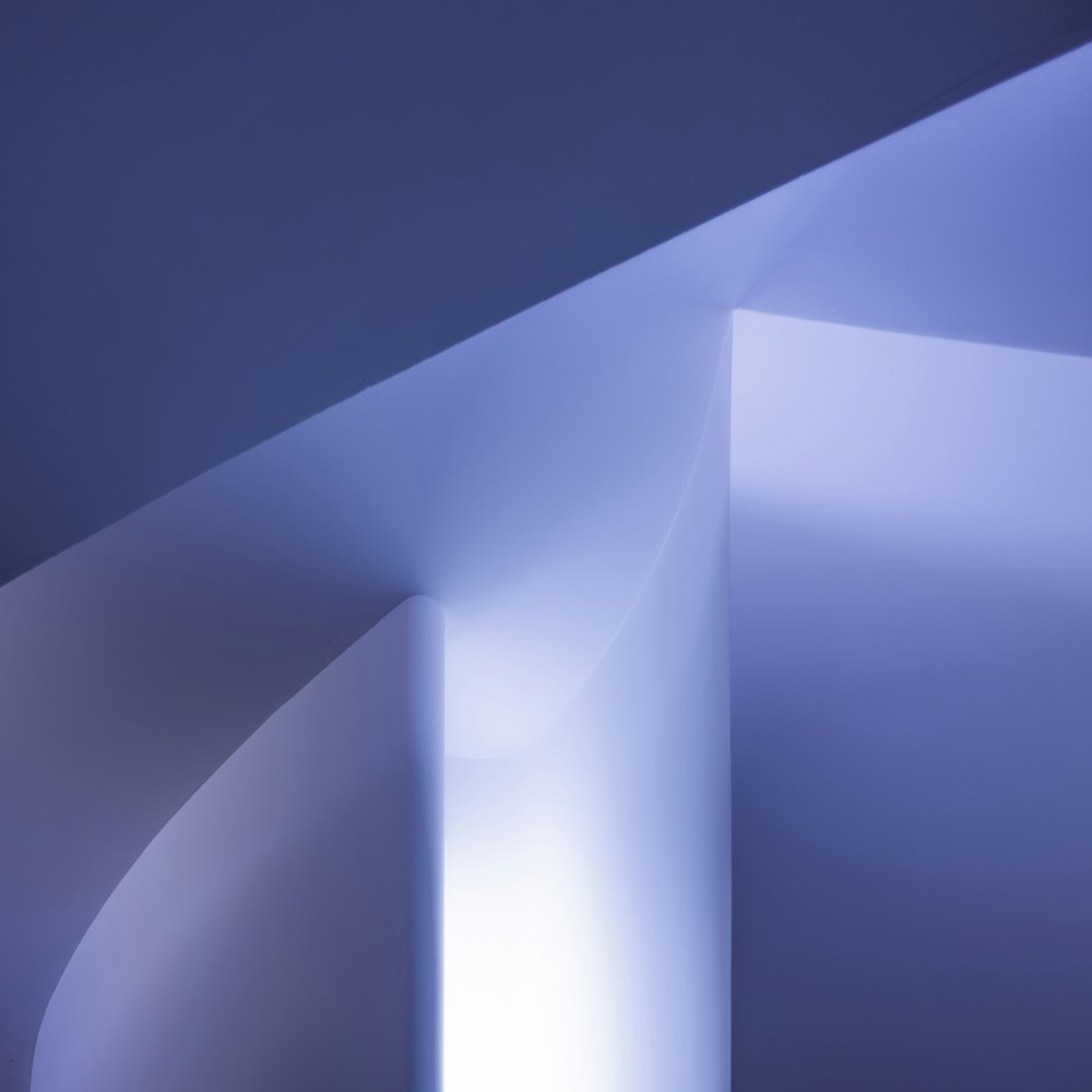 an abstract photograph of a curved wall