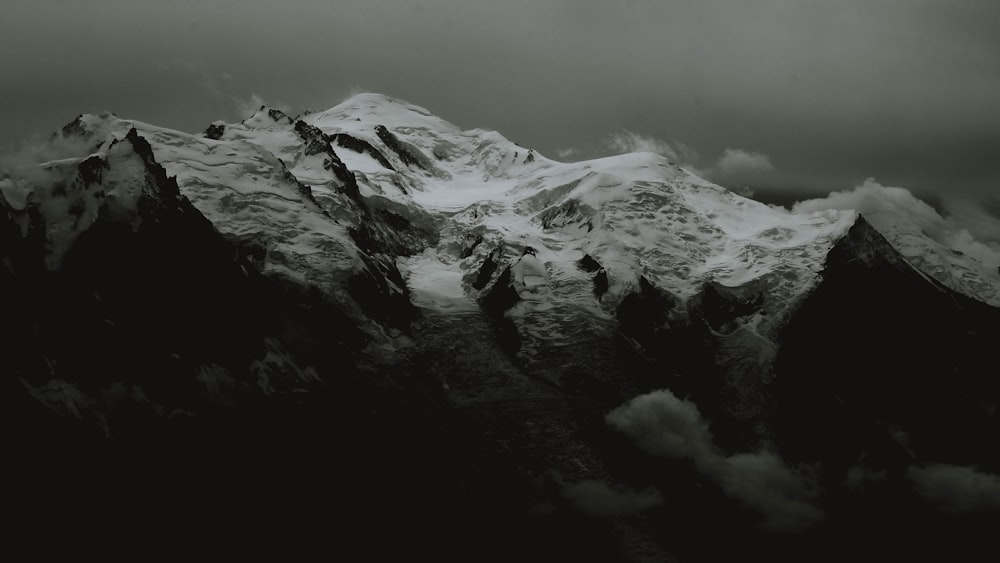 grayscale photography of mountain range