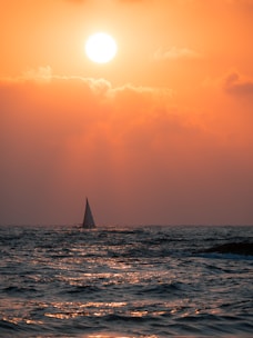 sailing boat on sea during daytime