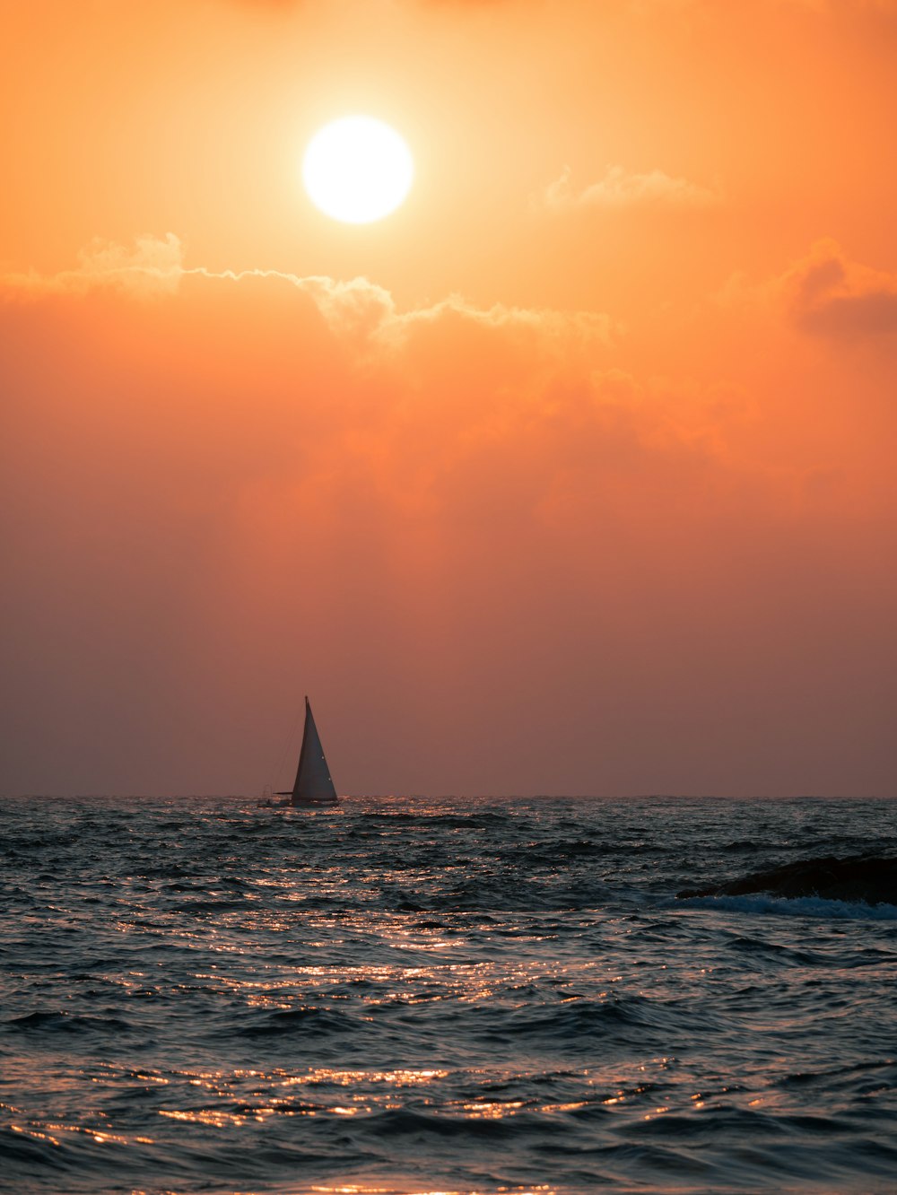 sailing boat on sea during daytime