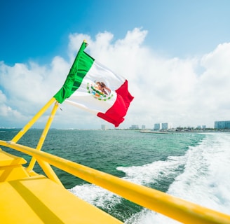 Mexico flag on yellow boat