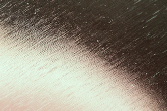 Before and after comparison of aluminum surface treated with 981 brightening agent