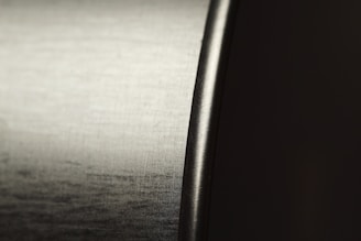 Close-up of stainless steel surface reflecting light.