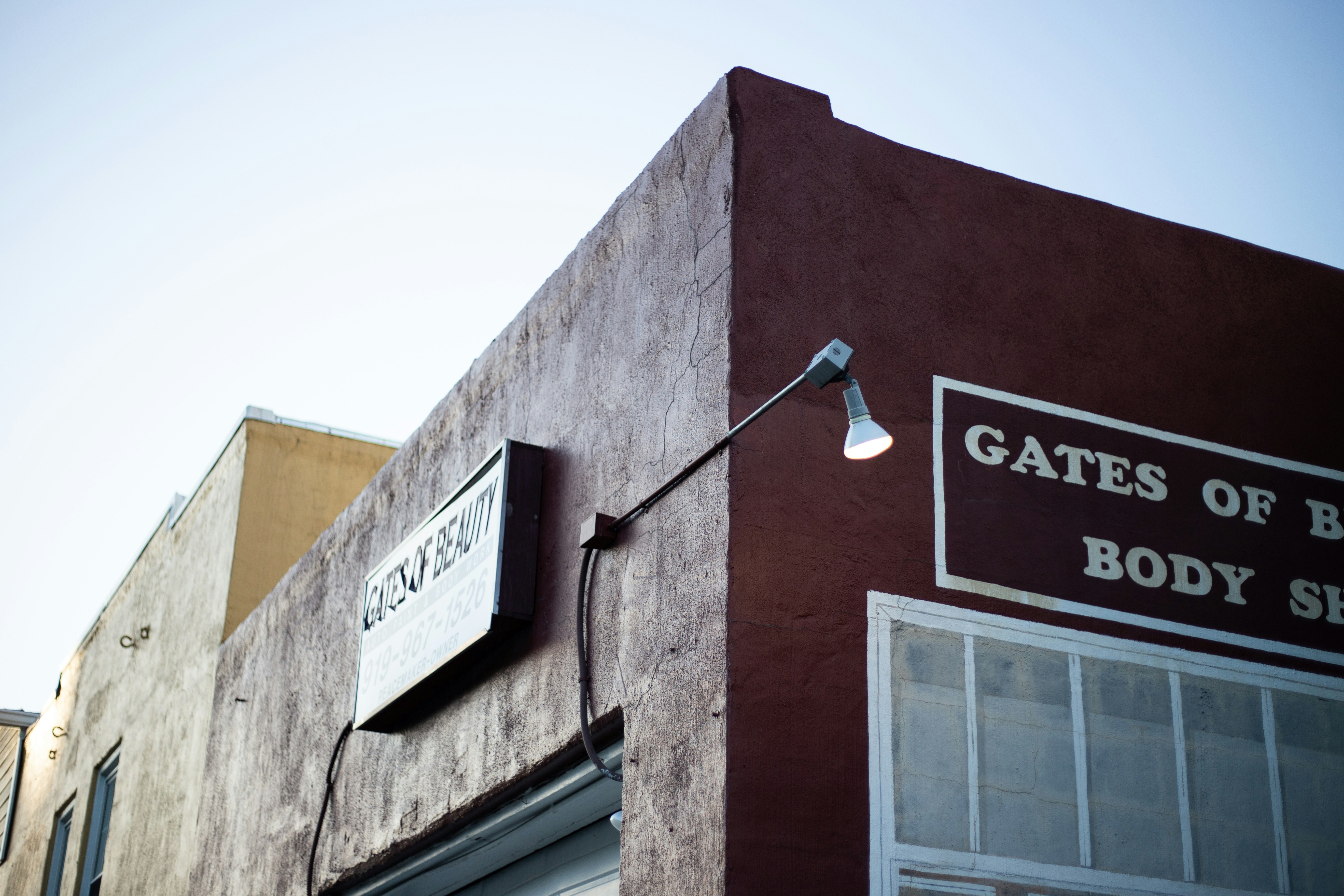 low angle photography of brown concrete house