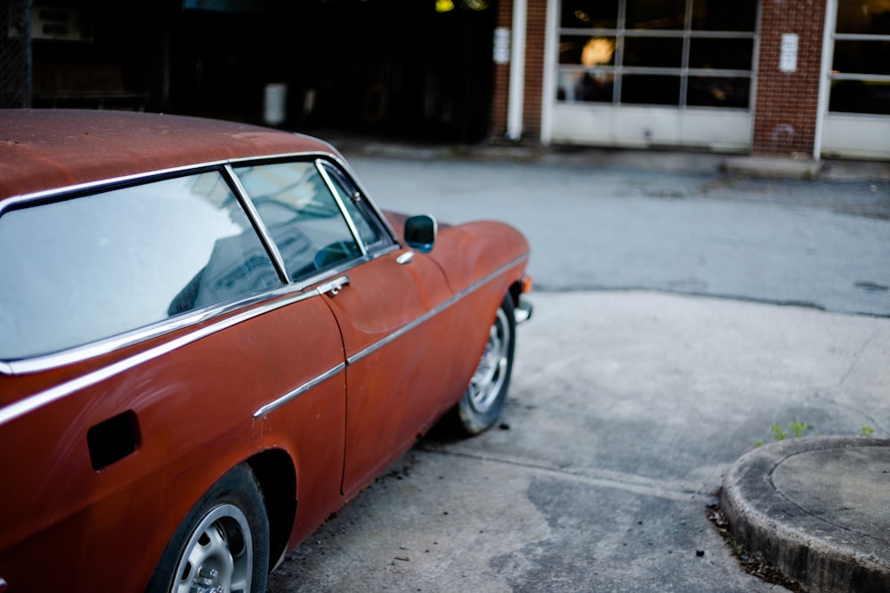 red sedan on focus photography