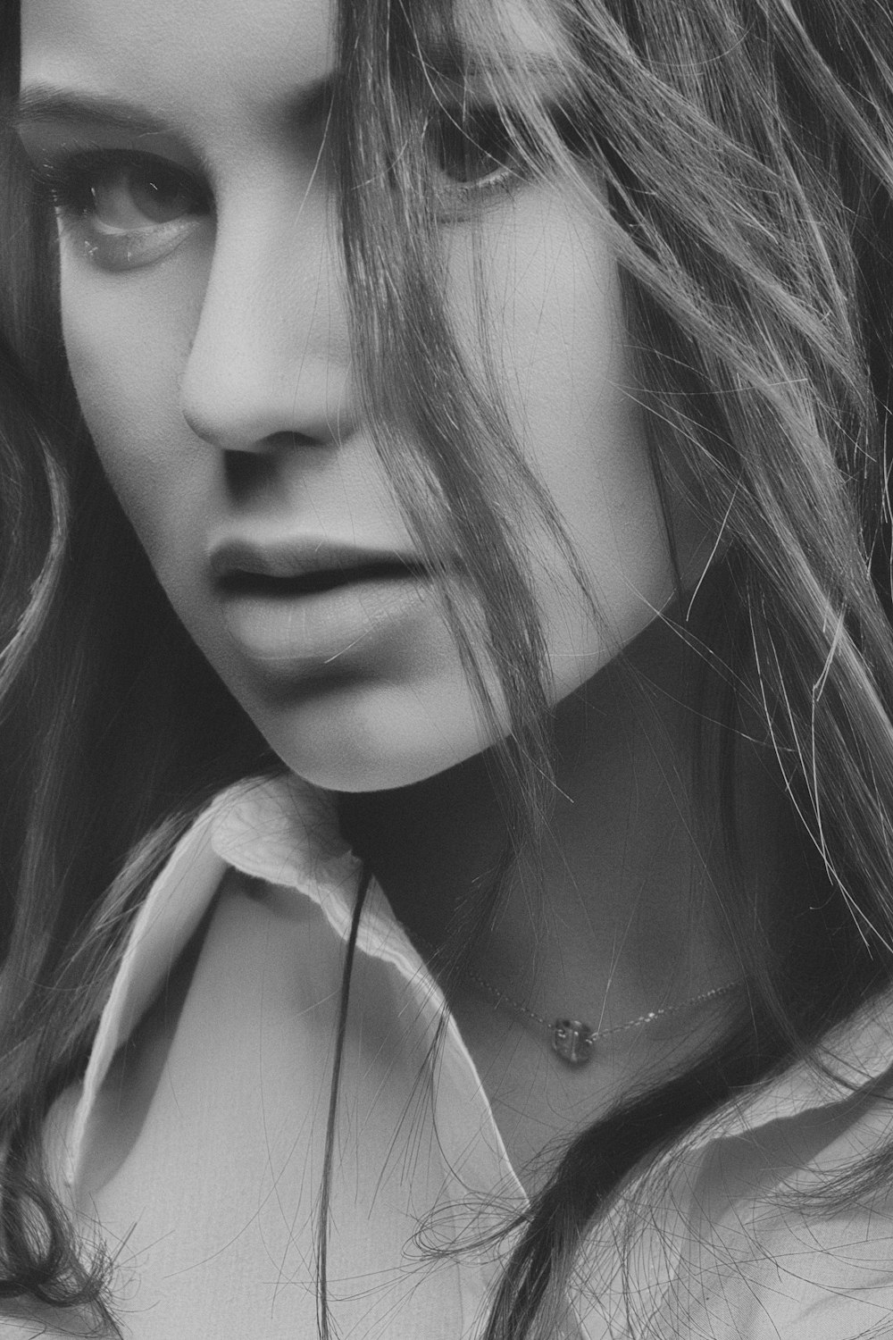 grayscale photography of woman wearing collared topp